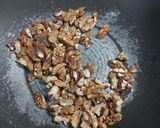 A picture of step 1 of Walnuts coconut burfi.