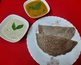 A picture of step 3 of Ragi dosa with sambar and chutney.