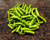 A picture of step 1 of Green Chilies Thecha.