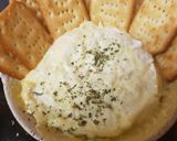 A picture of step 2 of Camembert soft and smooth heated in the oven yum!!.