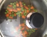 A picture of step 2 of Spicy carrot and pea.