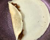 A picture of step 4 of Coconut Jaggery Stuffed Pancakes.