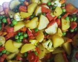 A picture of step 2 of Carrot, Potato, Cauliflower, and Pea Vegetable Curry.