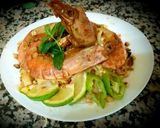 A picture of step 3 of Pad thai with king prawns and lemon slices and tagliatelle rice.