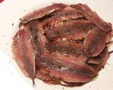 Foto del paso 7 de la receta Cazuela de boqueroncillos, en salsa de tomate, ajo y perejil