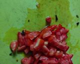 A picture of step 1 of Lal saag tomato curry.