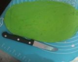 A picture of step 11 of Cricket 🏏 theme cake.