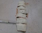 A picture of step 8 of Pizza Pinwheels.