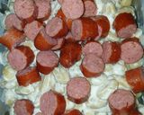 Une image de l'étape 5 de Gratin de gnocchis saucisses Fumées et Salers.