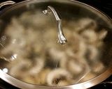 A picture of step 4 of Chicken Lombardy.