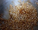 A picture of step 4 of Halky phulky bhook mein Masala popcorns.