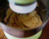 A picture of step 5 of Mini and Cute Cocoa Marble Bread | used two loaf pans.