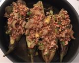 A picture of step 4 of Karnıyarık (Eggplants Stuffed with Ground Meat Sauce).