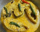 A picture of step 4 of Bhapa Ilish## Steamed Hilsa.