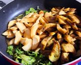 A picture of step 5 of Eggplant and King Oyster Mushrooms Stir-Fried with Basil.