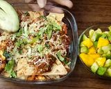 A picture of step 7 of Left-over roti Nachos with Mango-Avocado salad.