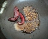 A picture of step 8 of Punjabi kadhi with baked pakoras.