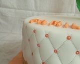A picture of step 9 of Chocolate with ground nuts cake covered in fondant.