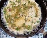 A picture of step 2 of Egg omelet with paratha.