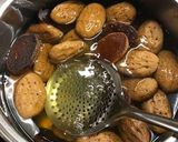 A picture of step 9 of Christmas cookies dipped in honey, aka melomakarona.