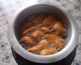 A picture of step 6 of Crunchy coconut Mandazi.