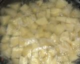 A picture of step 2 of Burger stuffed potatoes bread.