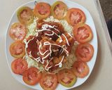Foto del paso 7 de la receta: Empanizado de pollo en ensalada de col y tomates
