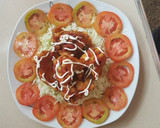 Foto del paso 7 de la receta: Empanizado de pollo en ensalada de col y tomates