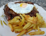 Foto del paso 4 de la receta: Bifes de costilla a caballo con papas fritas