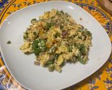 A picture of step 13 of Scrambled Eggs with Green Peppers, Red Onion, and Coulommiers Cheese.