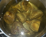 Foto del paso 2 de la receta: Arroz meloso de chipirones con alcachofas confitadas