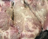 A picture of step 1 of Seared Pork in a cast iron skillet/ The belly buster.