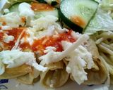 A picture of step 3 of Chicken Flautas.