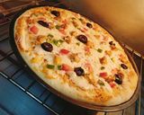 A picture of step 3 of Chicken Tikka Pizza 🍕🍕.