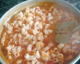 A picture of step 6 of Cheesy red sauce pasta.