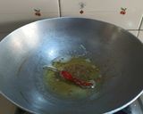 A picture of step 2 of Achari aam sabji.