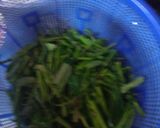 Foto langkah ke 1 dari resep Kangkung cah bawang putih.