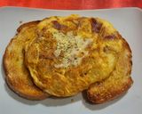 A picture of step 4 of Spanish Potato Omelette with Ham and Cheese.