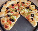A picture of step 7 of Cheesy Bites Chicken Tikka Pizza 🍕🧀🍕🧀🍕.
