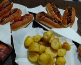 A picture of step 1 of Hotdog's in two ways and some fried potatoes.