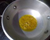 A picture of step 4 of Khatte meethe Amla.