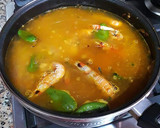 Foto del paso 11 de la receta: Arroz con jugos de cigalas, almejas y pimientos tipo padrón