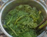 A picture of step 3 of Salmon and Garland Chrysanthemum Rice Balls.