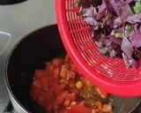 A picture of step 3 of Lal saag tomato curry.