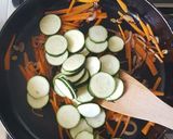 A picture of step 3 of Zuchinni Carrots Onion Stir Fry.