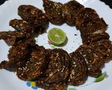 A picture of step 12 of Crispy Aadu Vadi.