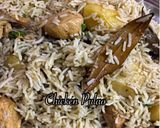 A picture of step 5 of Chicken Pulao.