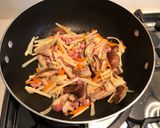 A picture of step 2 of Bacon, seafood bamboo seasoned rice.