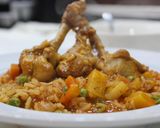 Foto del paso 3 de la receta: Guiso de arroz y alitas de pollo