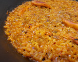 Foto del paso 6 de la receta: Arroz seco de muslitos de pollo